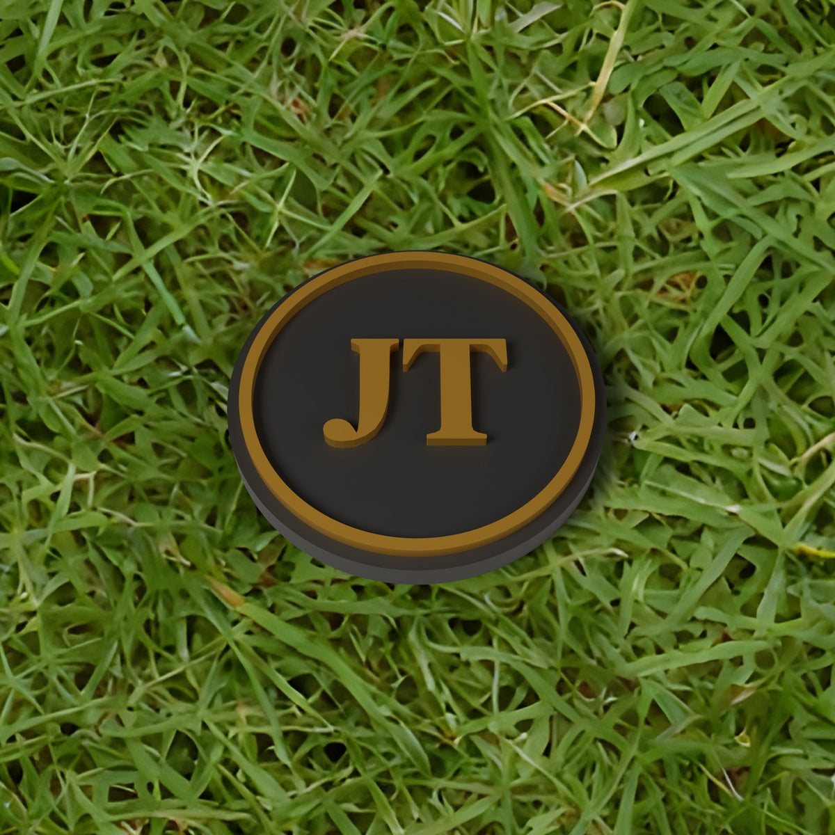 Personalised Golf Ball Marker - close-up of the raised lettering