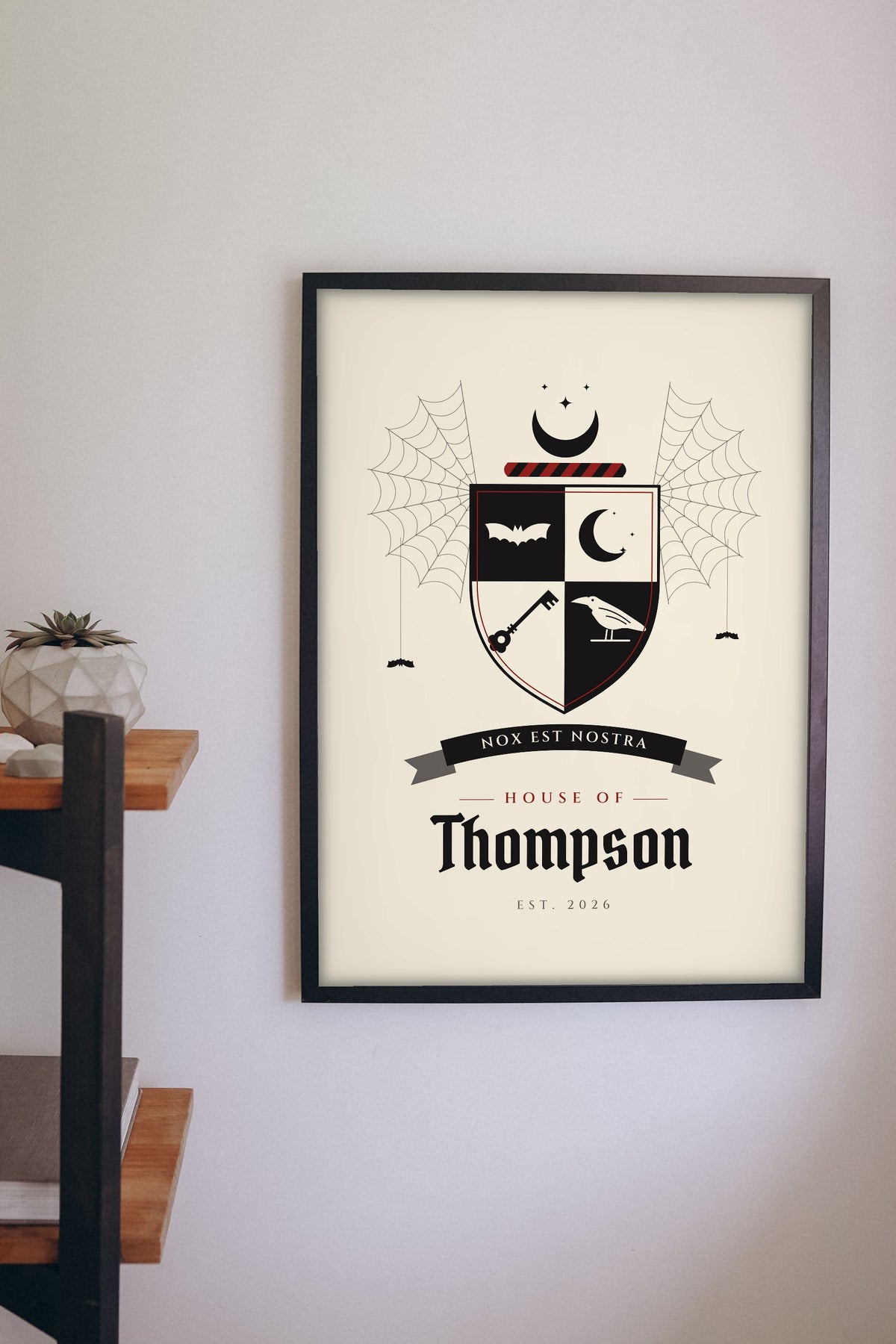 Personalised Gothic Family Crest Print - gothic family crest print on a hallway wall