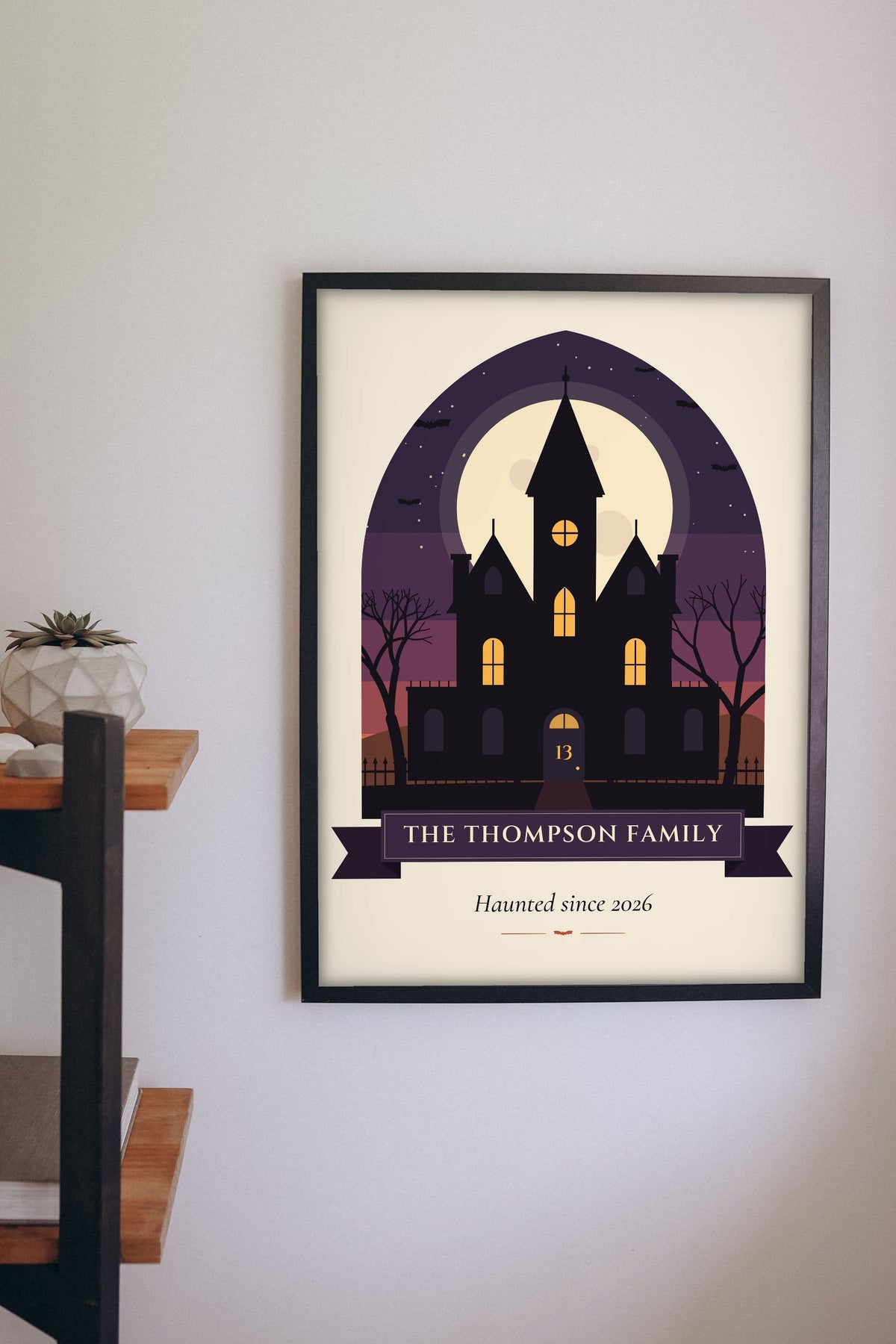 Personalised Haunted House Family Name Print - haunted house family print on a hallway wall
