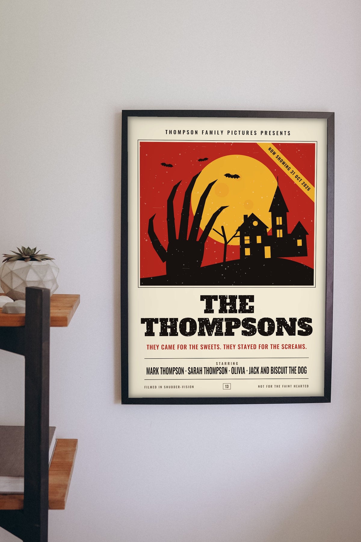 Personalised Horror Movie Family Poster - horror family poster on a hallway wall