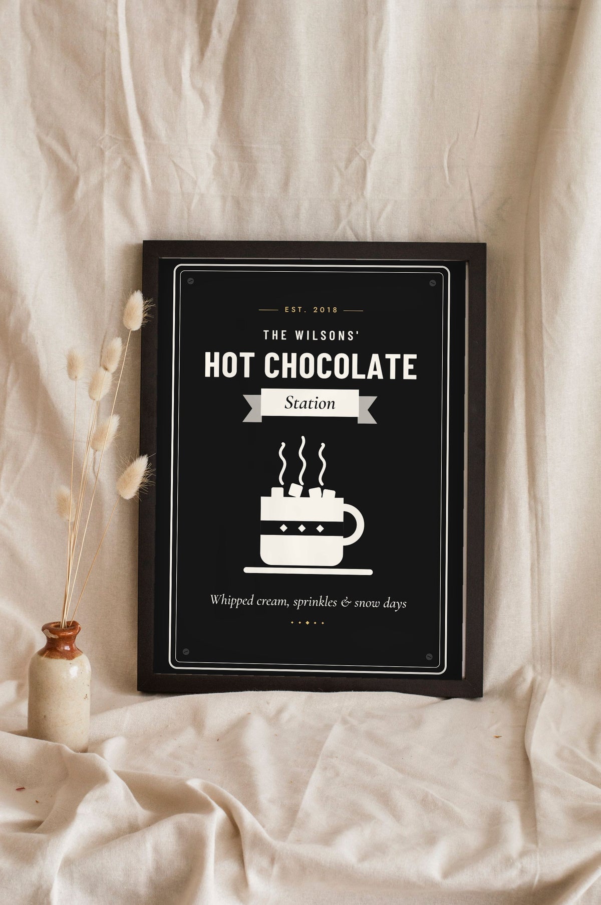 Personalised Hot Chocolate Station Sign Print - black and white hot chocolate sign leaning on a shelf