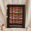 Personalised Retro Wavy Name Print - dark retro wavy family name print leaning on a shelf