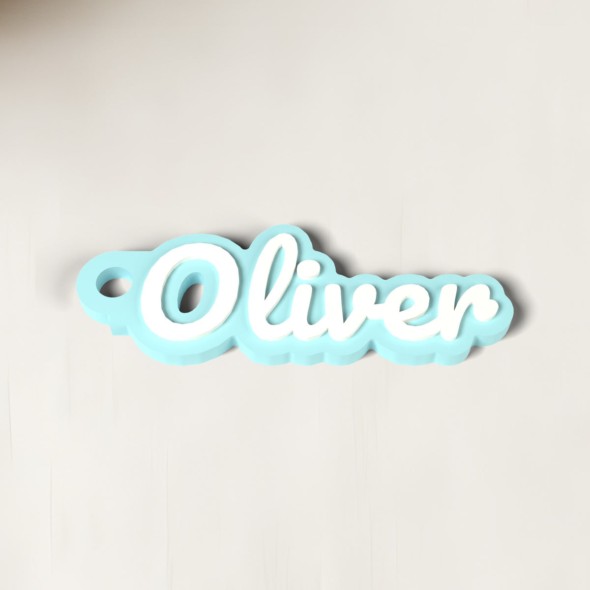 Personalised School Bag Name Tag - close-up of the raised lettering
