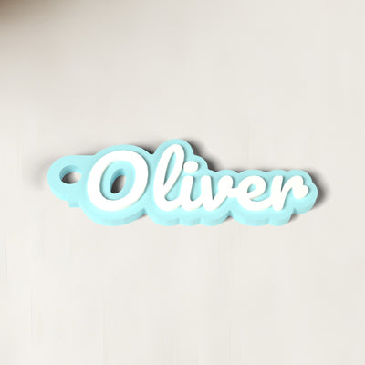Personalised School Bag Name Tag - close-up of the raised lettering