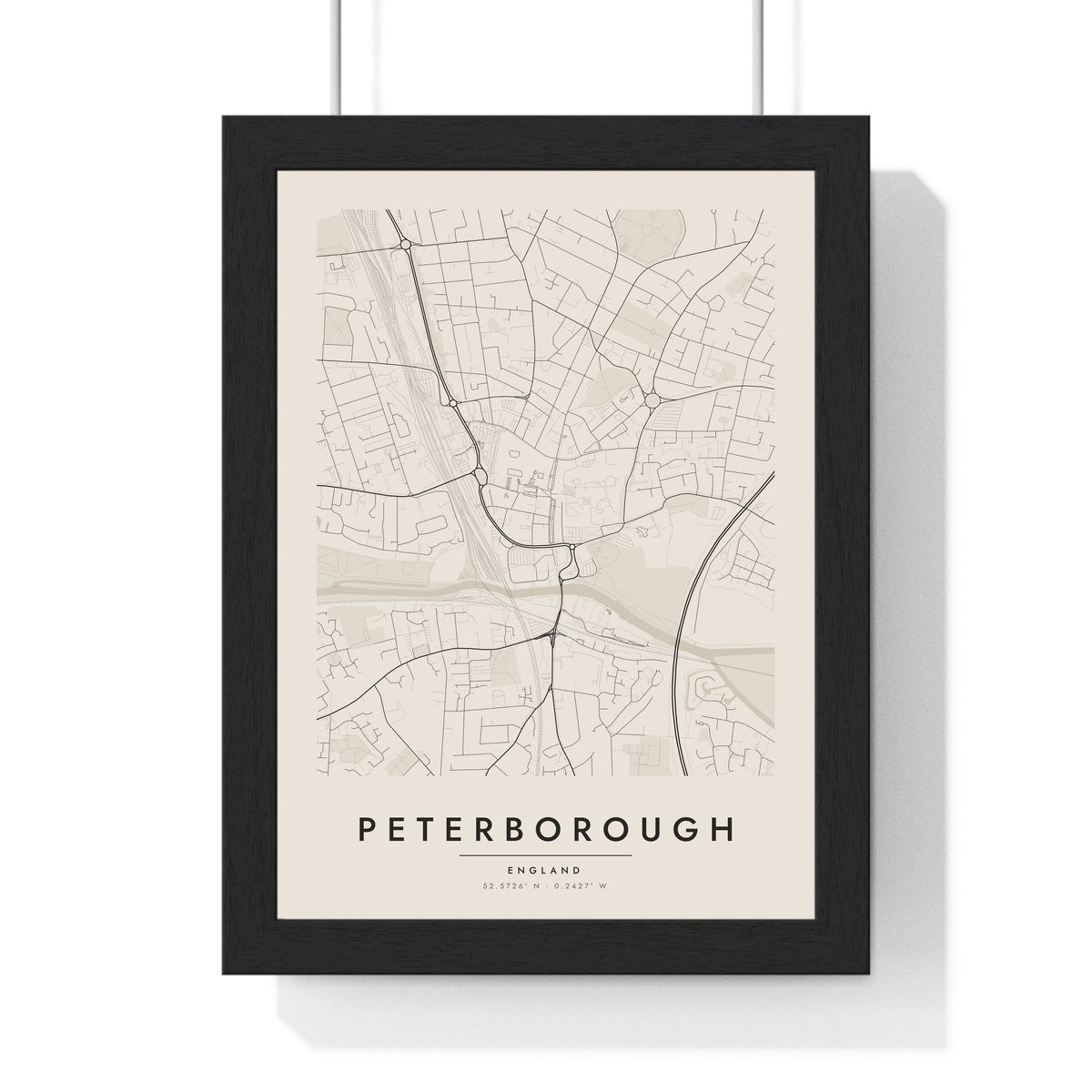 Peterborough street map poster in cream, minimal city map print framed in a black frame