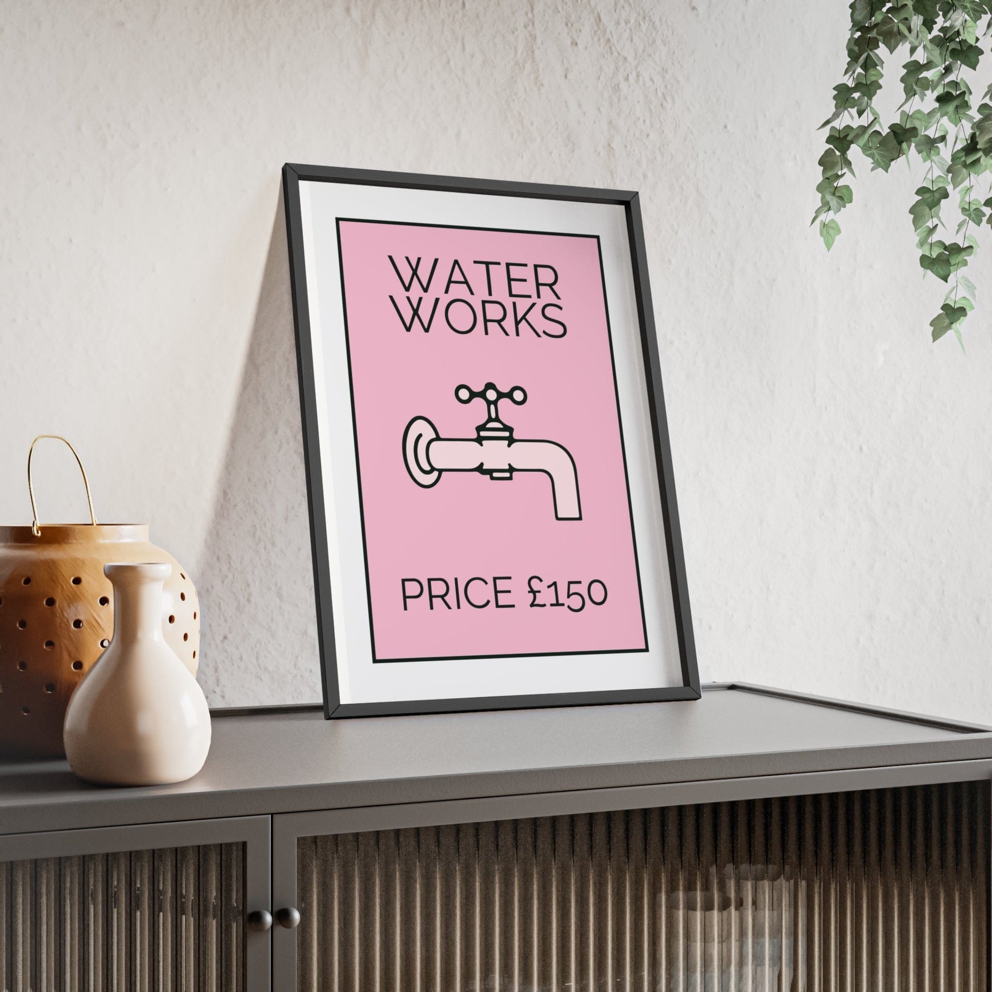 Framed Pink Water Works Funny Monopoly-Inspired Bathroom Print print