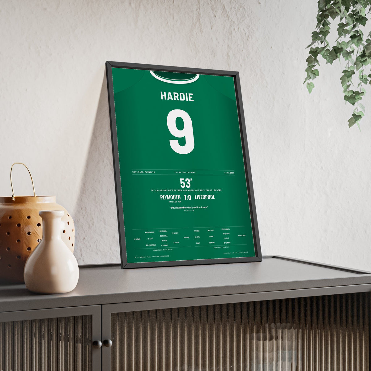 Plymouth Argyle 1-0 Liverpool FA Cup 2025 Poster - Ryan Hardie 9 Home Park Shirt Print framed and leaning on a sideboard