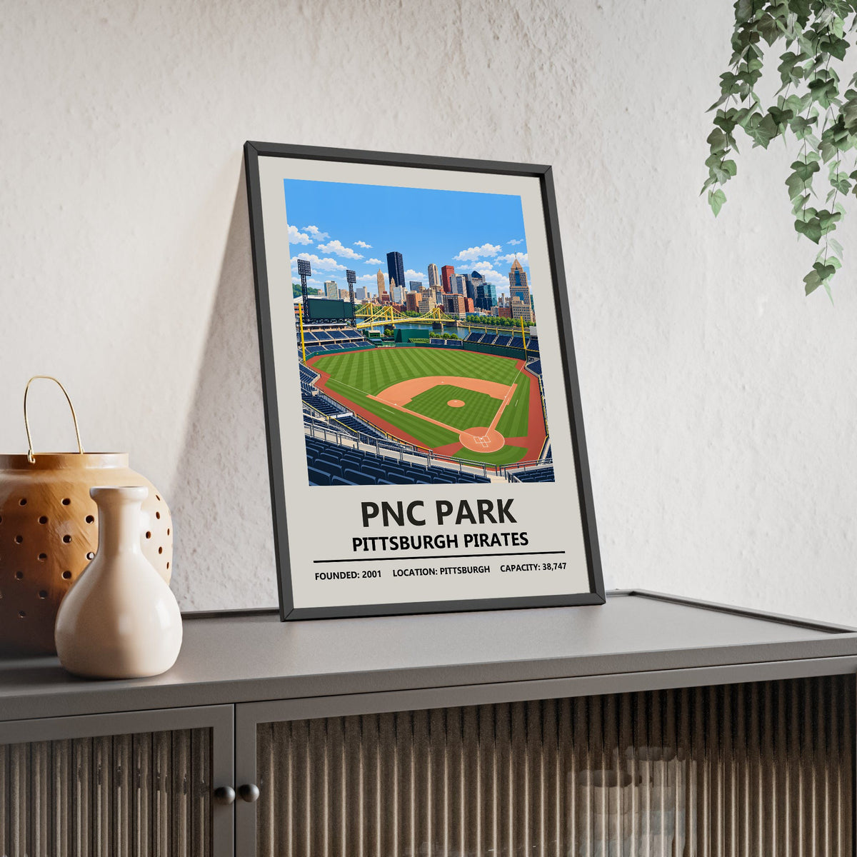 PNC Park Pittsburgh Pirates print framed and leaning on a sideboard