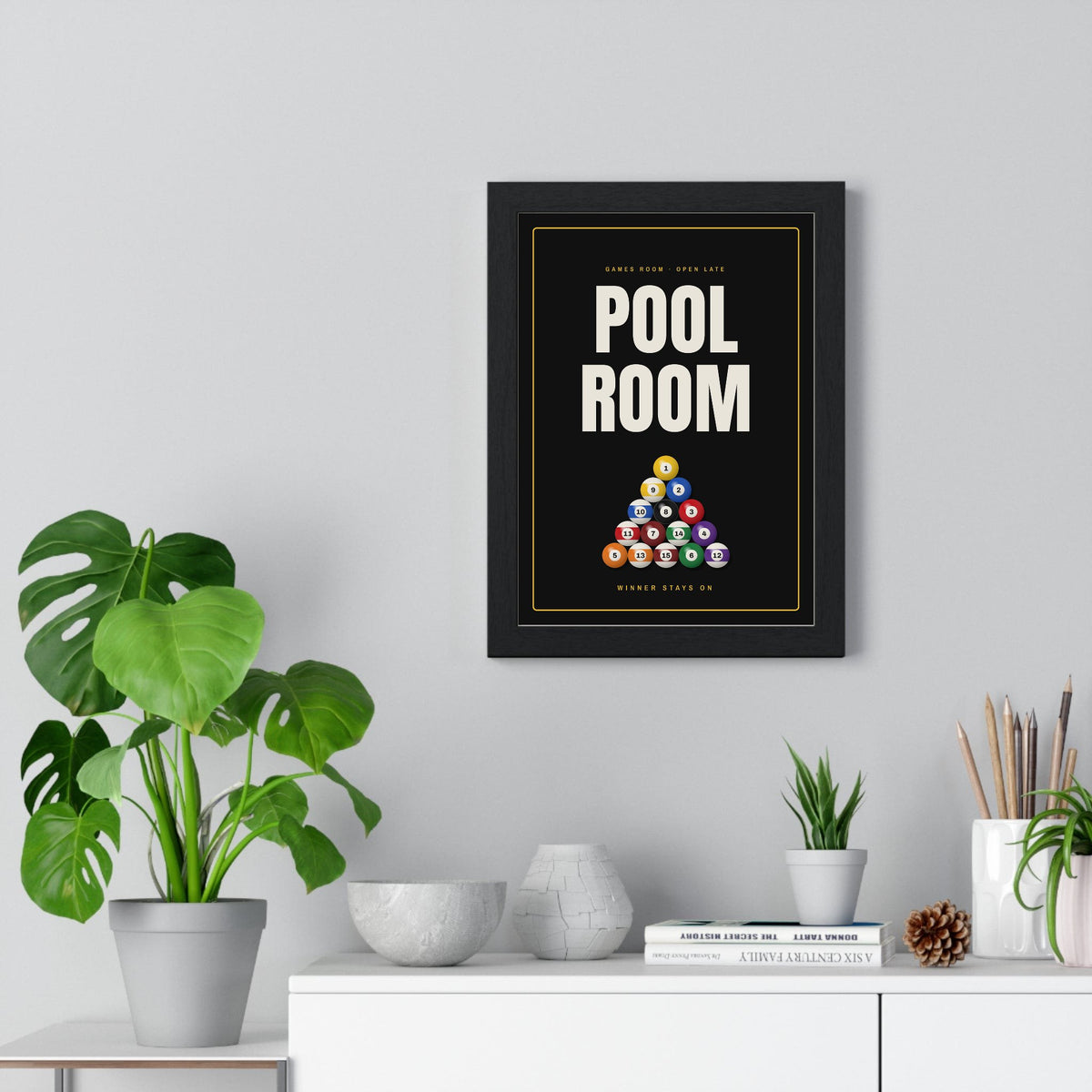Pool Room Sign print framed on a living room wall