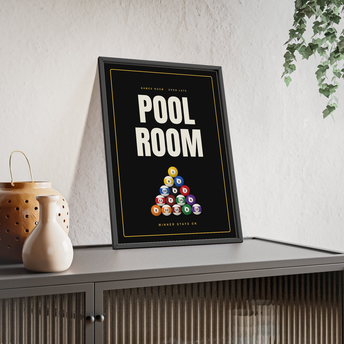 Pool Room Sign print framed and leaning on a sideboard