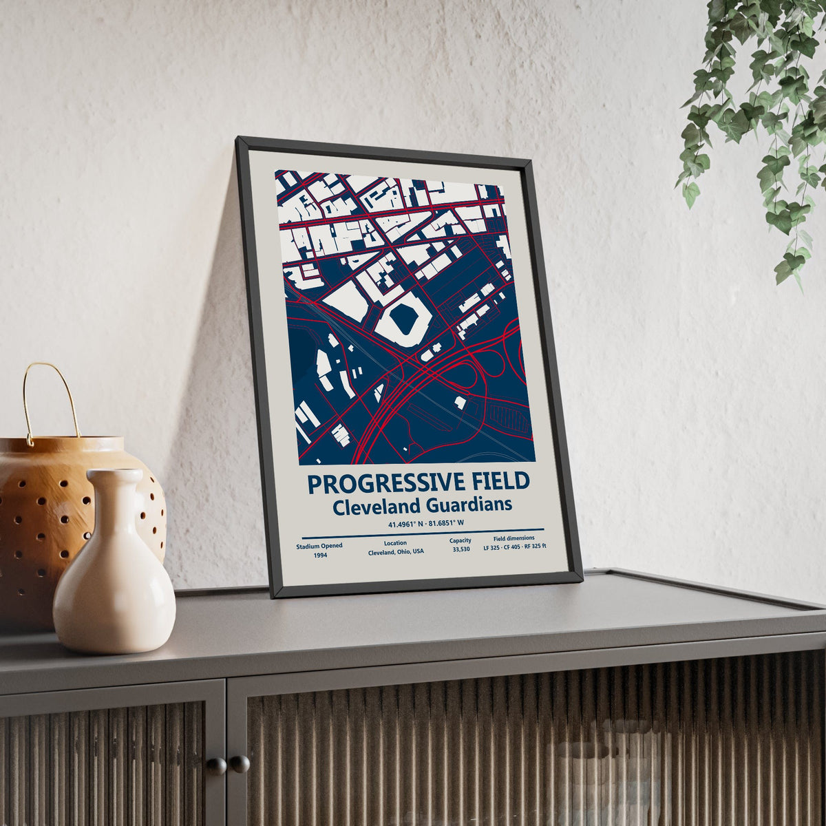 Progressive Field map print framed and leaning on a sideboard