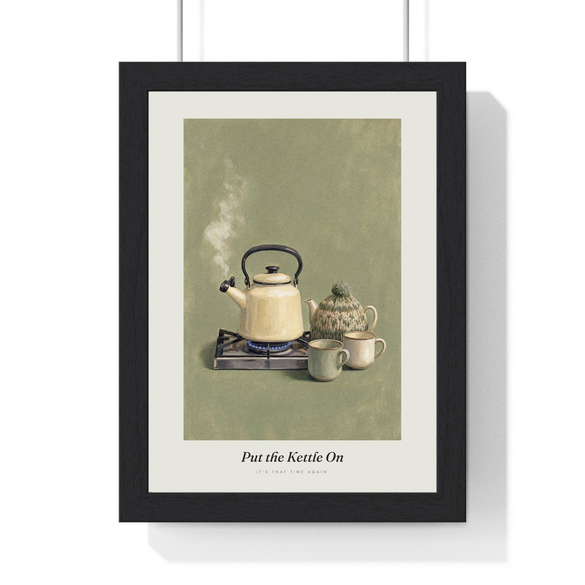 Put the Kettle On Print framed in a black frame, ready to hang