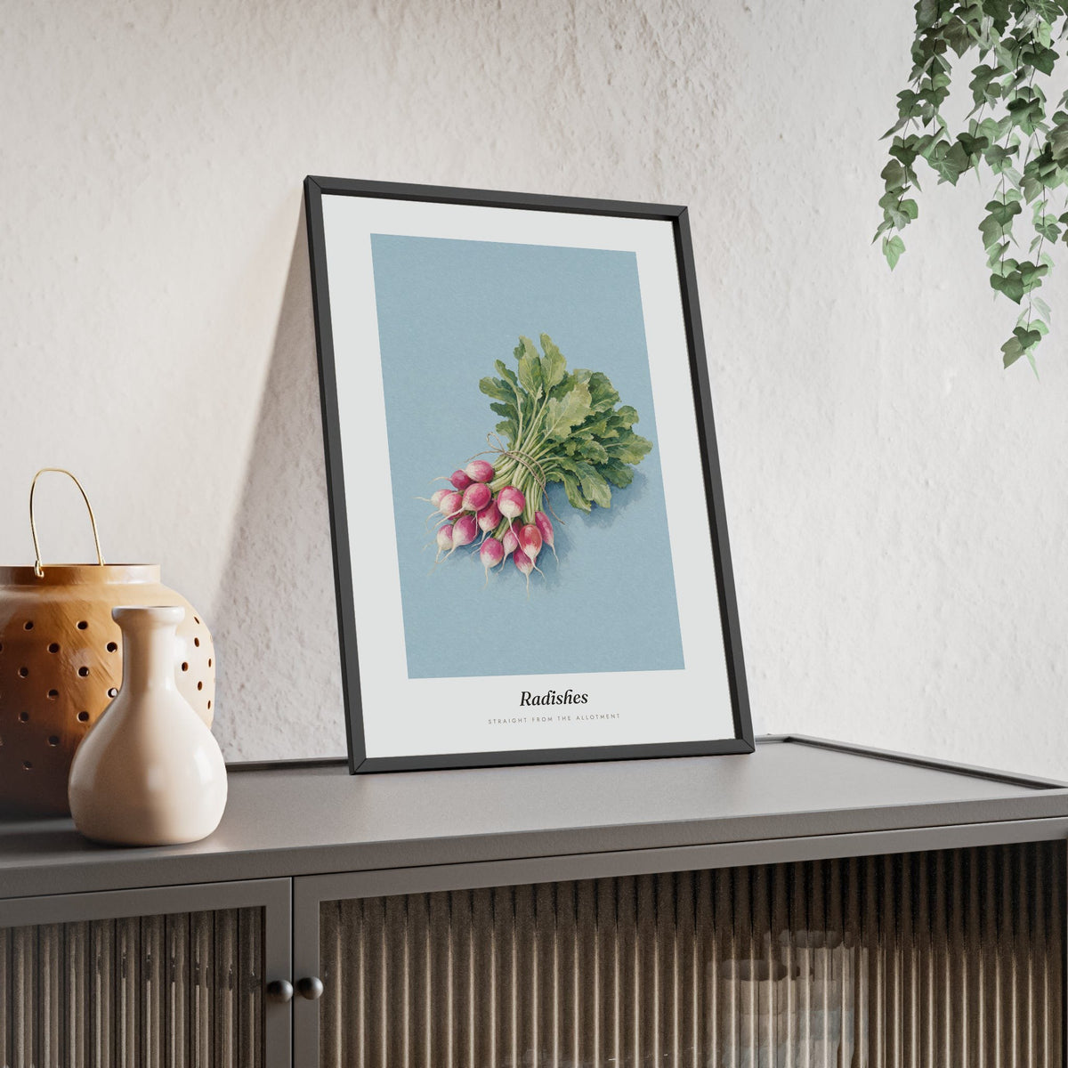 Radishes Print framed and leaning on a sideboard