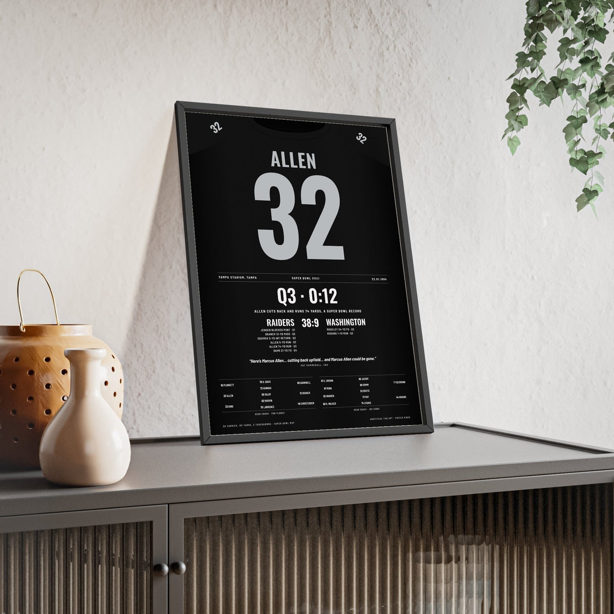 Los Angeles Raiders Super Bowl XVIII Poster - Marcus Allen 32 74-Yard Run Jersey Print framed and leaning on a sideboard