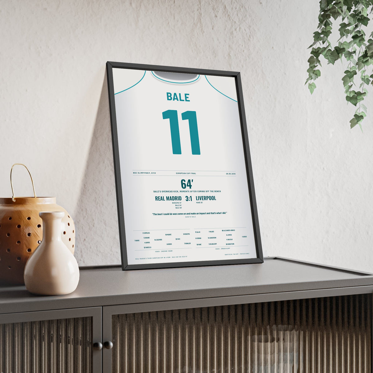 Real Madrid Champions League Final 2018 Poster - Gareth Bale 11 Overhead Kick Kyiv Shirt Print framed and leaning on a sideboard