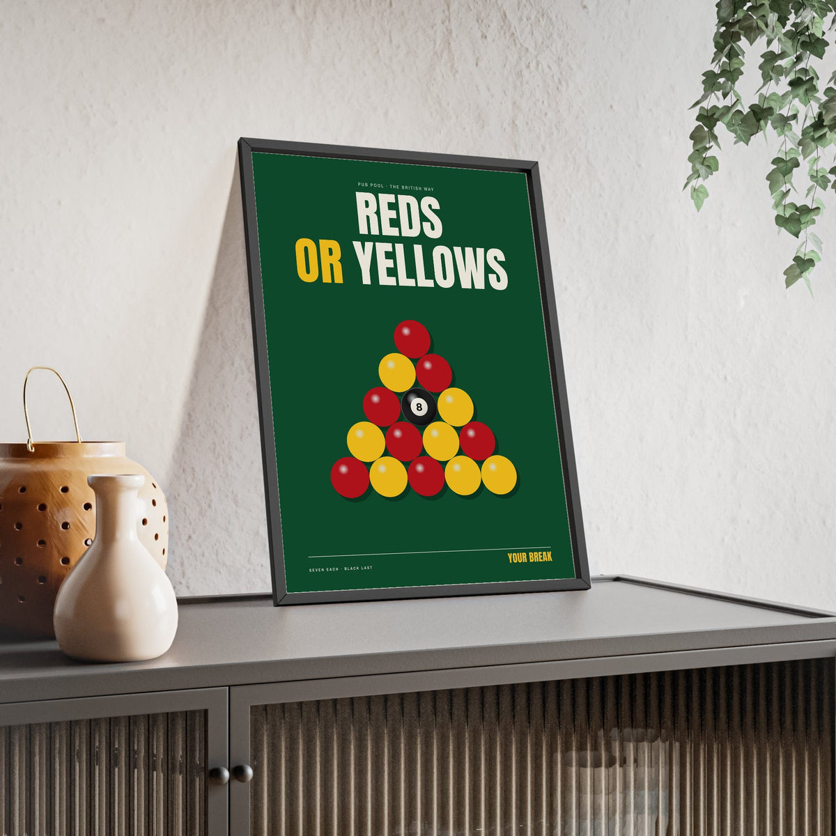 Reds or Yellows Pool print framed and leaning on a sideboard