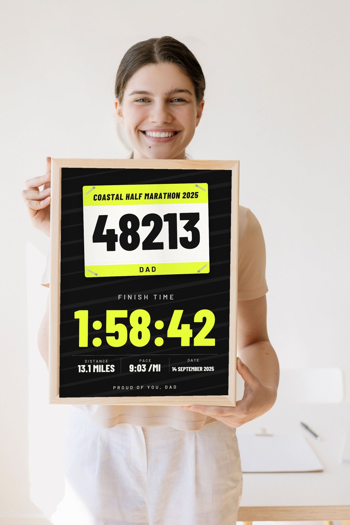 Personalised Marathon Finisher Print - Lifestyle - held by a smiling woman