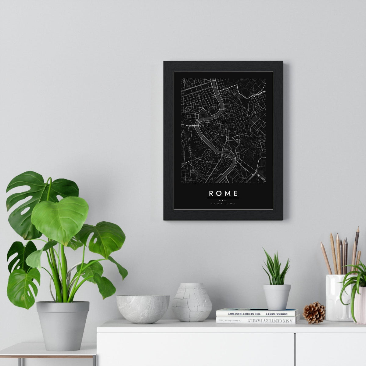 Rome street map poster in black, minimal city map print framed on a living room wall