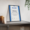Rory McIlroy Hoylake 2014 Golf Poster - Caddie Bib Wire to Wire Win Print framed and leaning on a sideboard