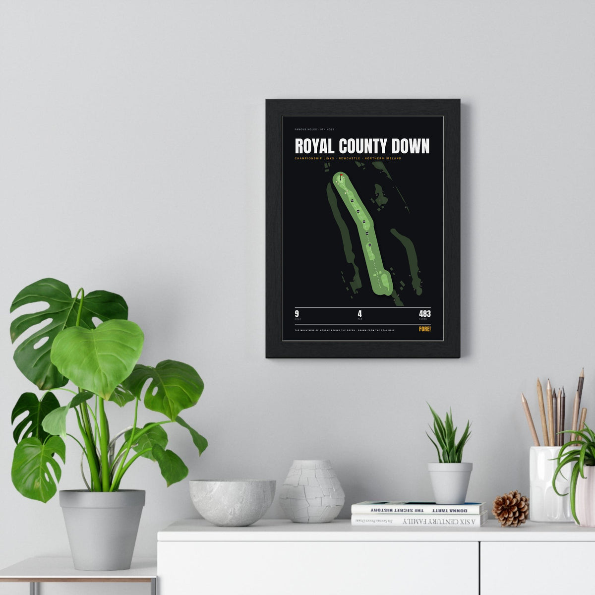 Royal County Down 9th Hole print framed on a living room wall