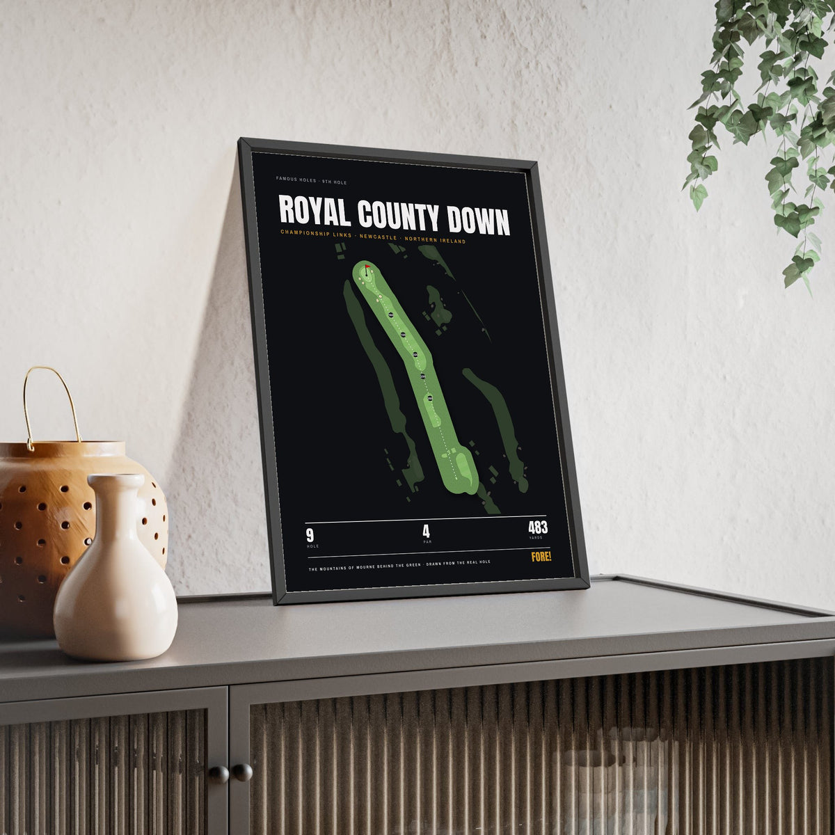 Royal County Down 9th Hole print framed and leaning on a sideboard