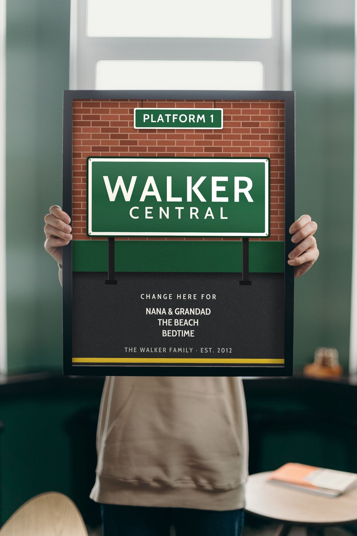 Personalised Railway Station Sign Print - Lifestyle - held up in a bright room