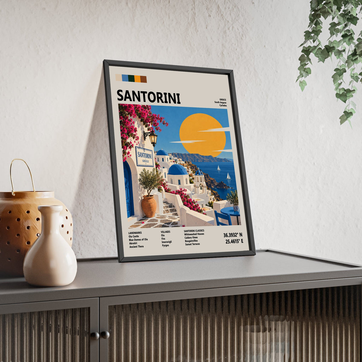 Santorini Mid Century Travel print framed and leaning on a sideboard