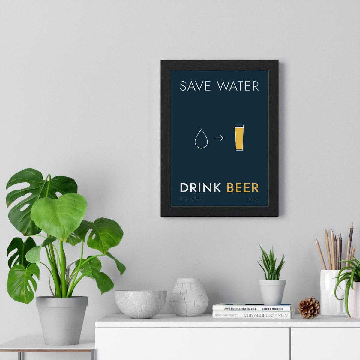 Save Water Drink Beer Print framed on a living room wall