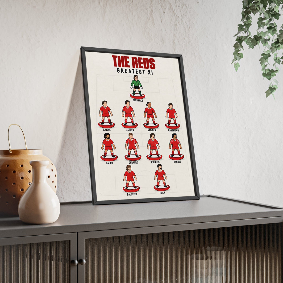 Liverpool Greatest XI framed print leaning on a sideboard