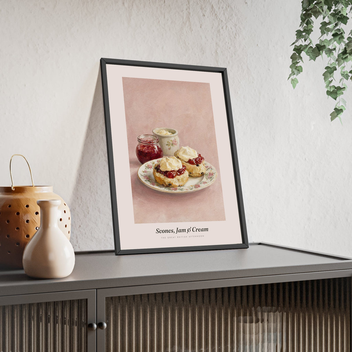 Scones, Jam and Cream Print framed and leaning on a sideboard