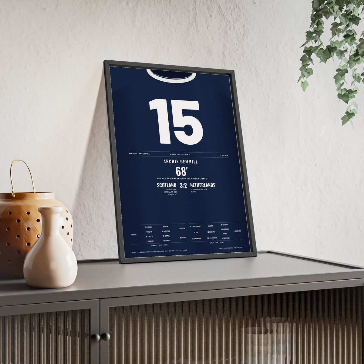 Scotland World Cup 1978 Poster - Archie Gemmill 15 Goal v Netherlands Shirt Print framed and leaning on a sideboard