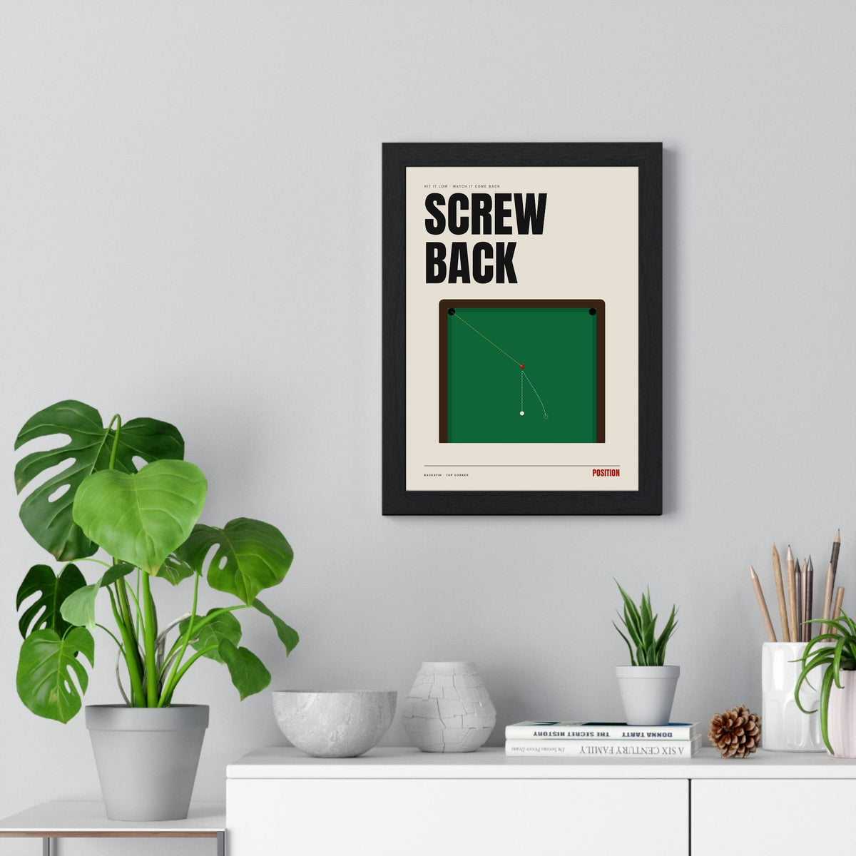 Screw Back Snooker print framed on a living room wall