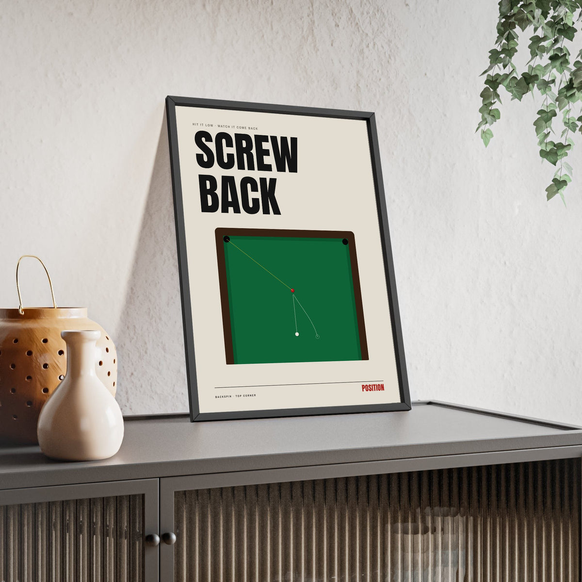 Screw Back Snooker print framed and leaning on a sideboard