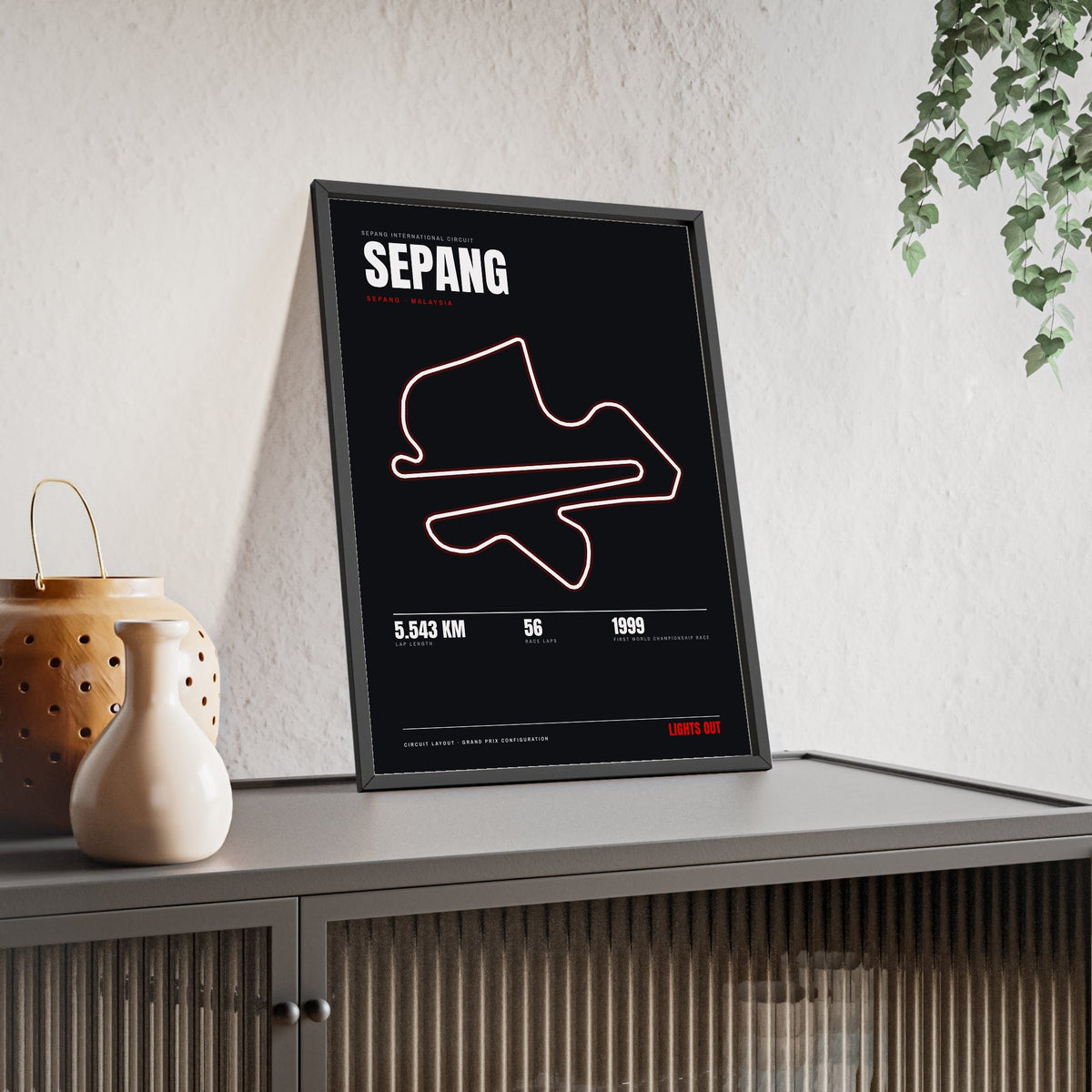 Sepang Circuit print framed and leaning on a sideboard