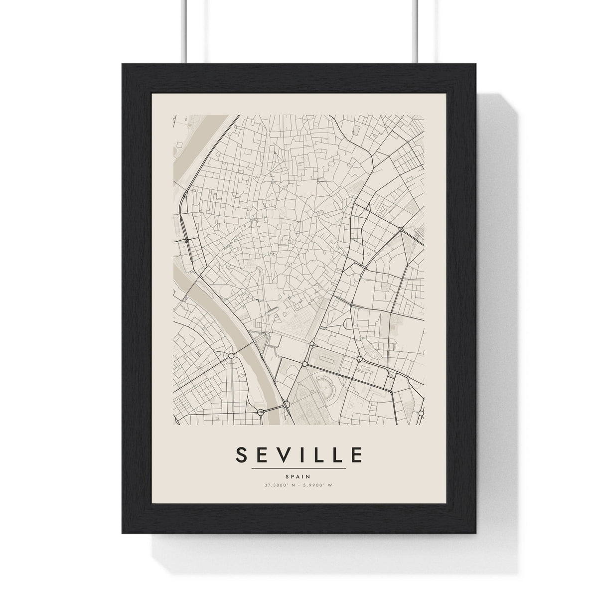 Seville street map poster in cream, minimal city map print framed in a black frame