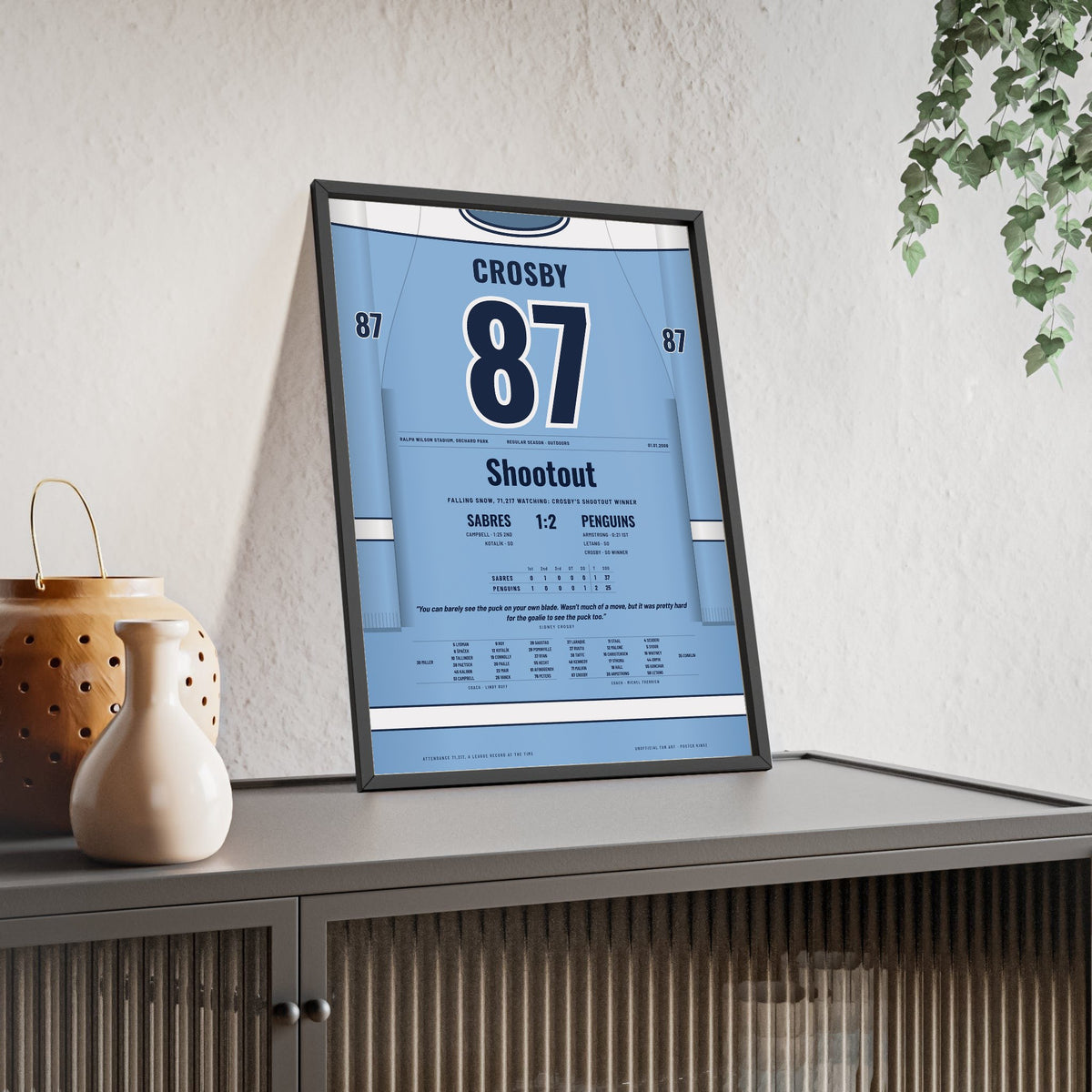 Sidney Crosby 2008 Outdoor Game Shootout Winner Poster - Pittsburgh Penguins 87 Hockey Jersey Print framed and leaning on a sideboard