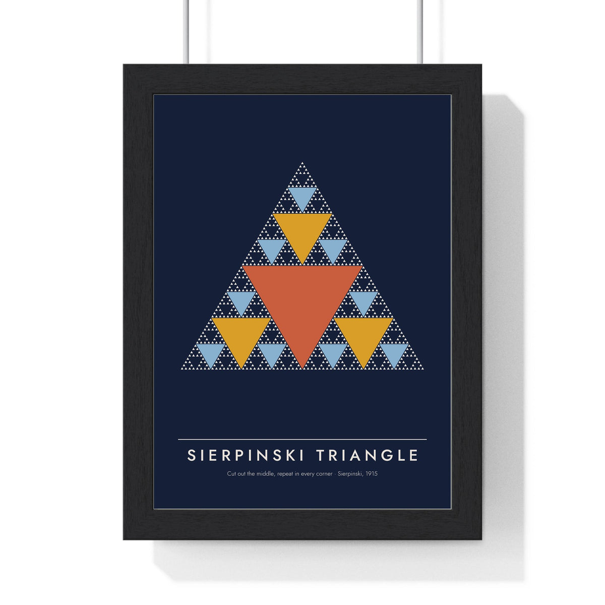 Sierpinski Triangle print framed in a black frame, ready to hang