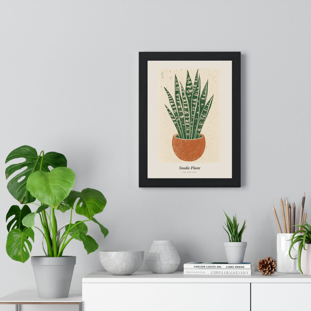 Snake Plant Lino Print framed on a living room wall
