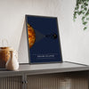Solar Eclipse print framed and leaning on a sideboard