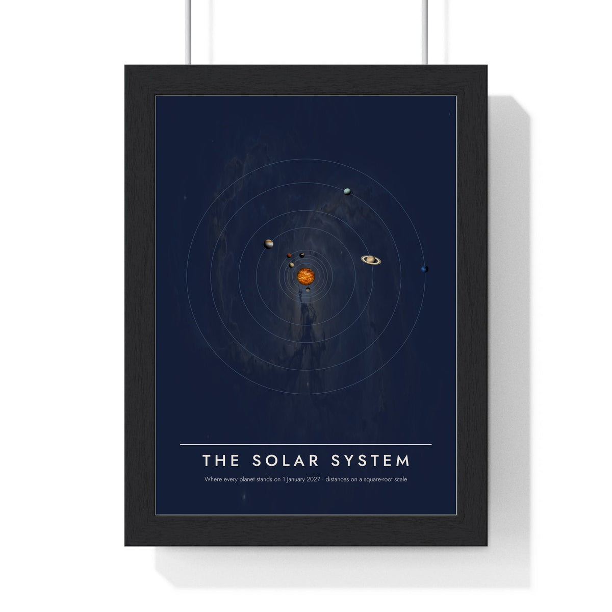 Solar System print framed in a black frame, ready to hang