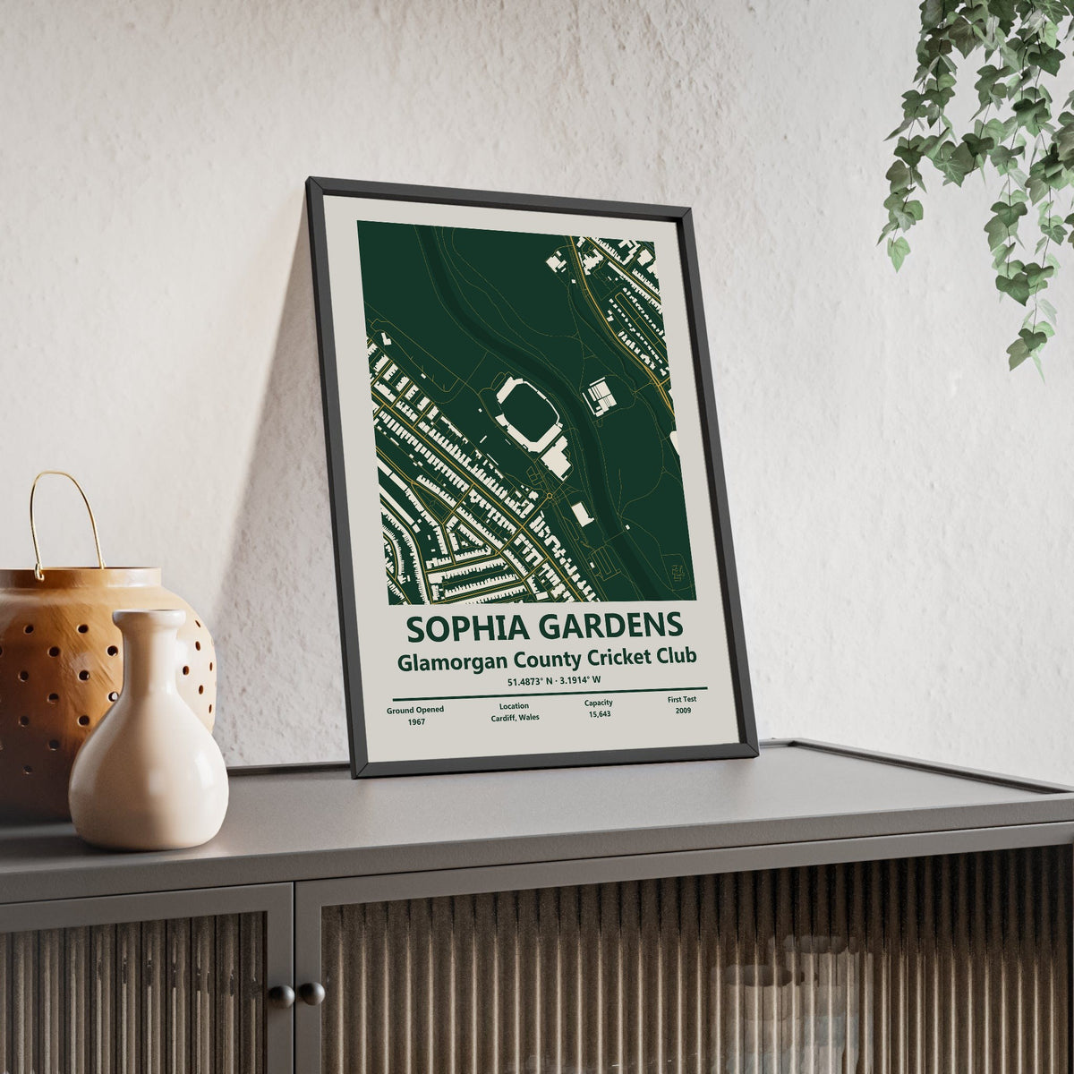 Sophia Gardens map print framed and leaning on a sideboard