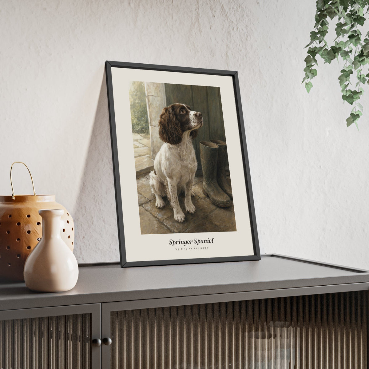 Springer Spaniel Print framed and leaning on a sideboard