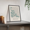 Square Maze print framed and leaning on a sideboard