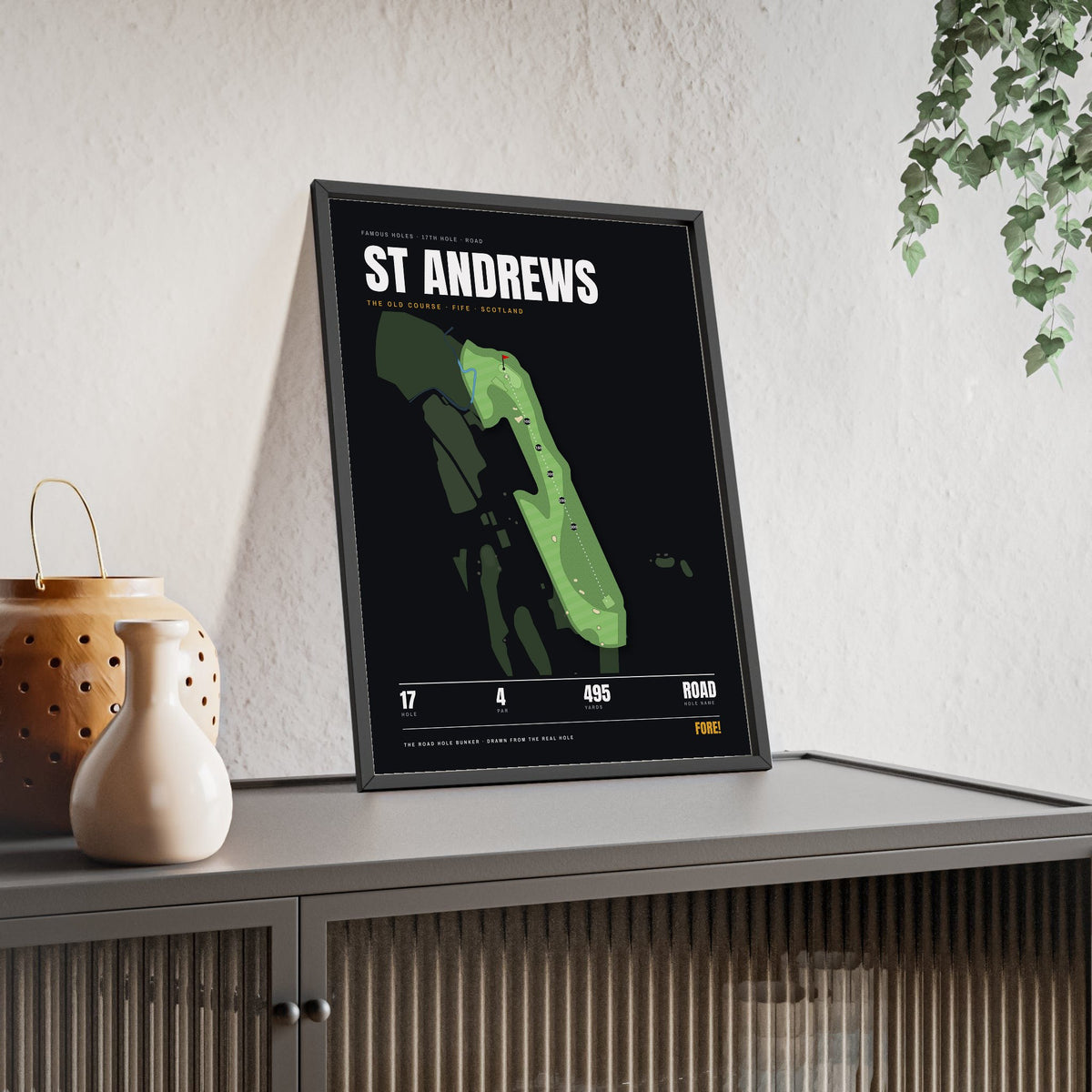 St Andrews 17th Hole print framed and leaning on a sideboard