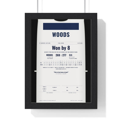 St Andrews 2000 Golf Poster - Caddie Bib 8 Shot Win Print framed in a black frame, ready to hang