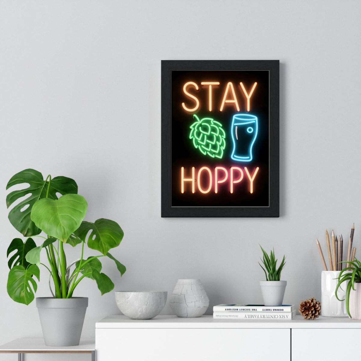 Stay Hoppy Neon Print framed on a living room wall
