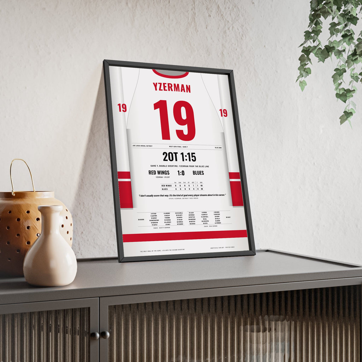 Steve Yzerman 1996 Double Overtime Winner Poster - Detroit Red Wings 19 Hockey Jersey Print framed and leaning on a sideboard