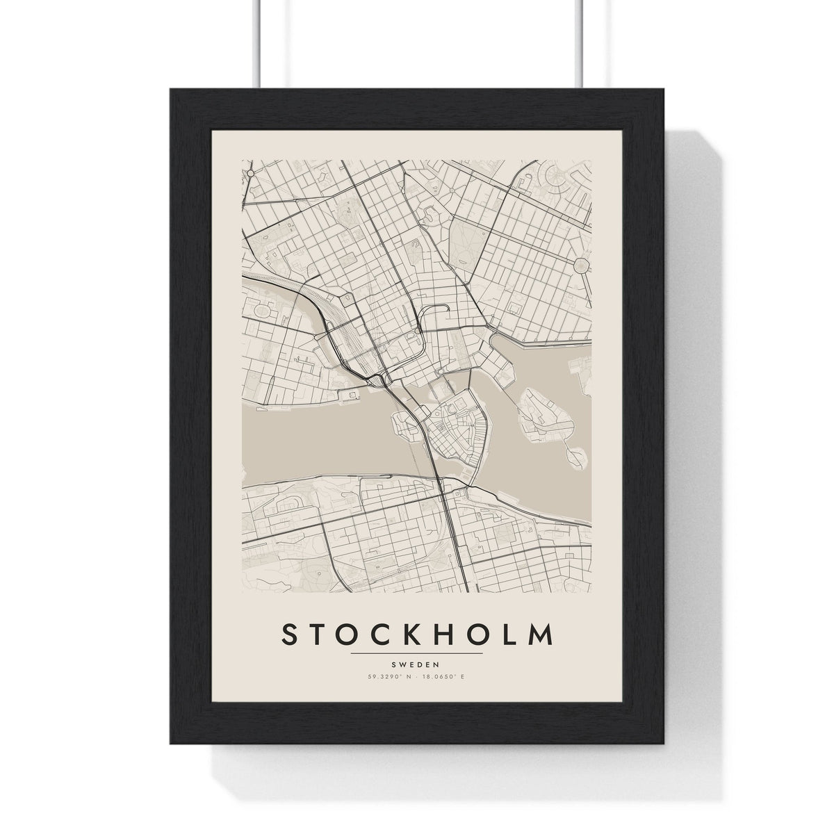 Stockholm street map poster in cream, minimal city map print framed in a black frame