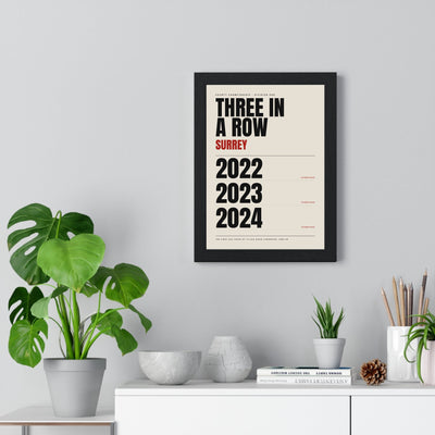 Surrey County Champions 2022-2024 print framed on a living room wall