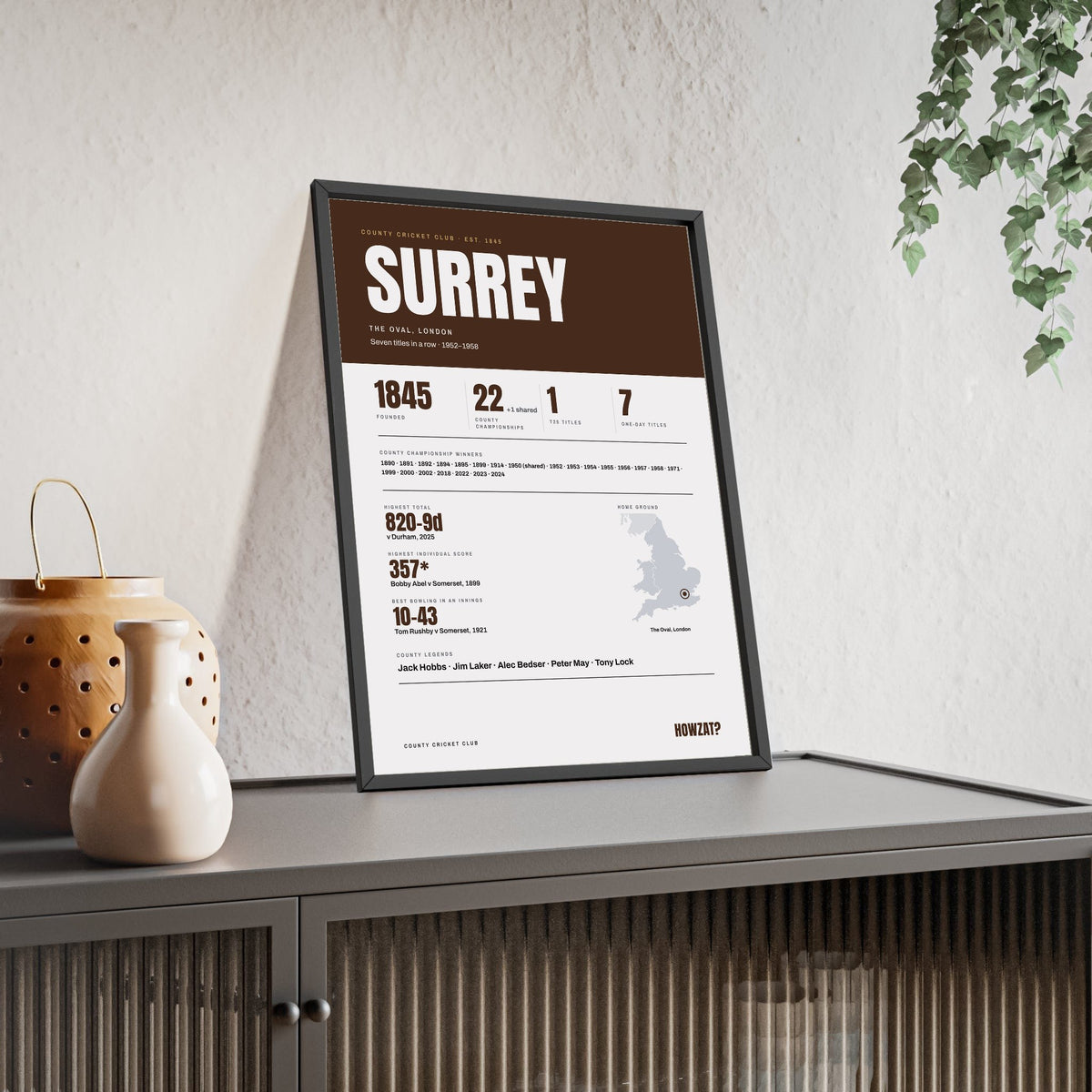 Surrey Cricket print framed and leaning on a sideboard